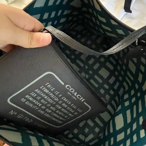 Coach purse. Reversible, lightly used, wristlet inside.